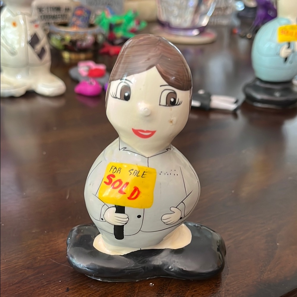 Rock Heads - Sales Lady/real-estate seller Charming Ceramic Figurine.